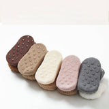 Chaussons-chaussettes en peluche bouclés