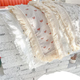 Das Wickeltuch mit Quasten (mehrere Drucke)