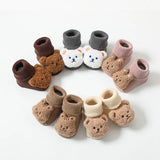 Chaussons-chaussettes en peluche bouclés