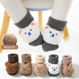 Chaussons-chaussettes en peluche bouclés
