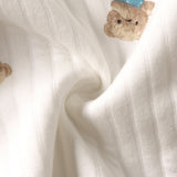Der charmante Baby-Strampelanzug „Bear“ aus Bouclé