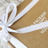 Gemütliche Geschenkbox mit Schleife