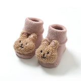 Chaussons-chaussettes en peluche bouclés