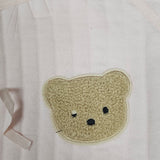 Sample Sale - 0-3m Pink boucle wrap - one eye half stitched