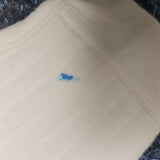 Sample Sale - 3-6m White Boucle - 'Ralph' in Gold thread with a blue mark on right leg