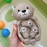 Floating Otter Family