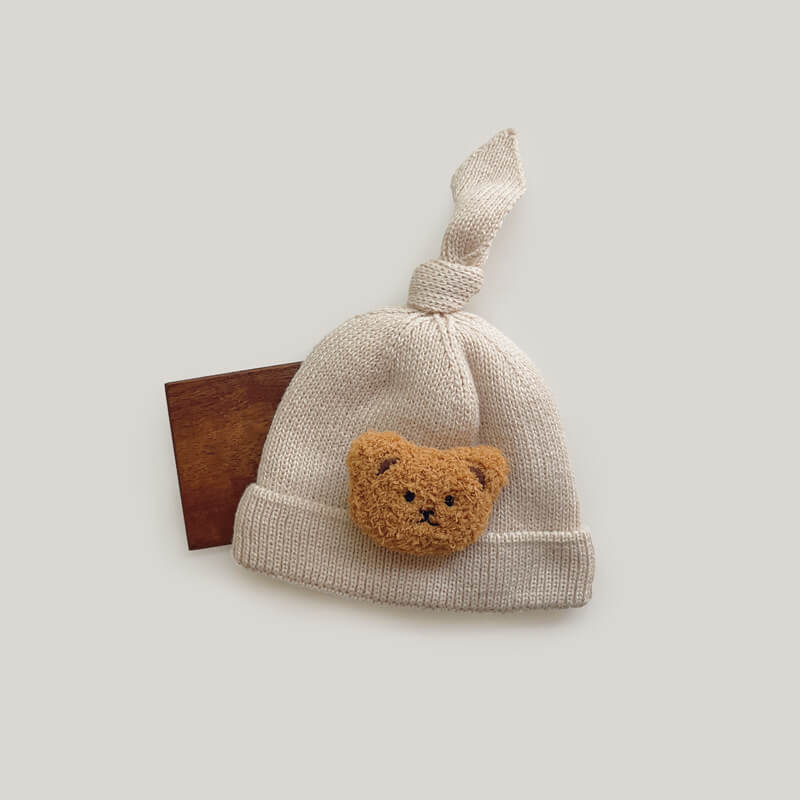 Bonnet douillet avec motif ours