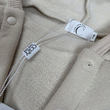 Sample Sale - 0-6m - Creme playsuit - top popper missing and 'Leo' in brown thread