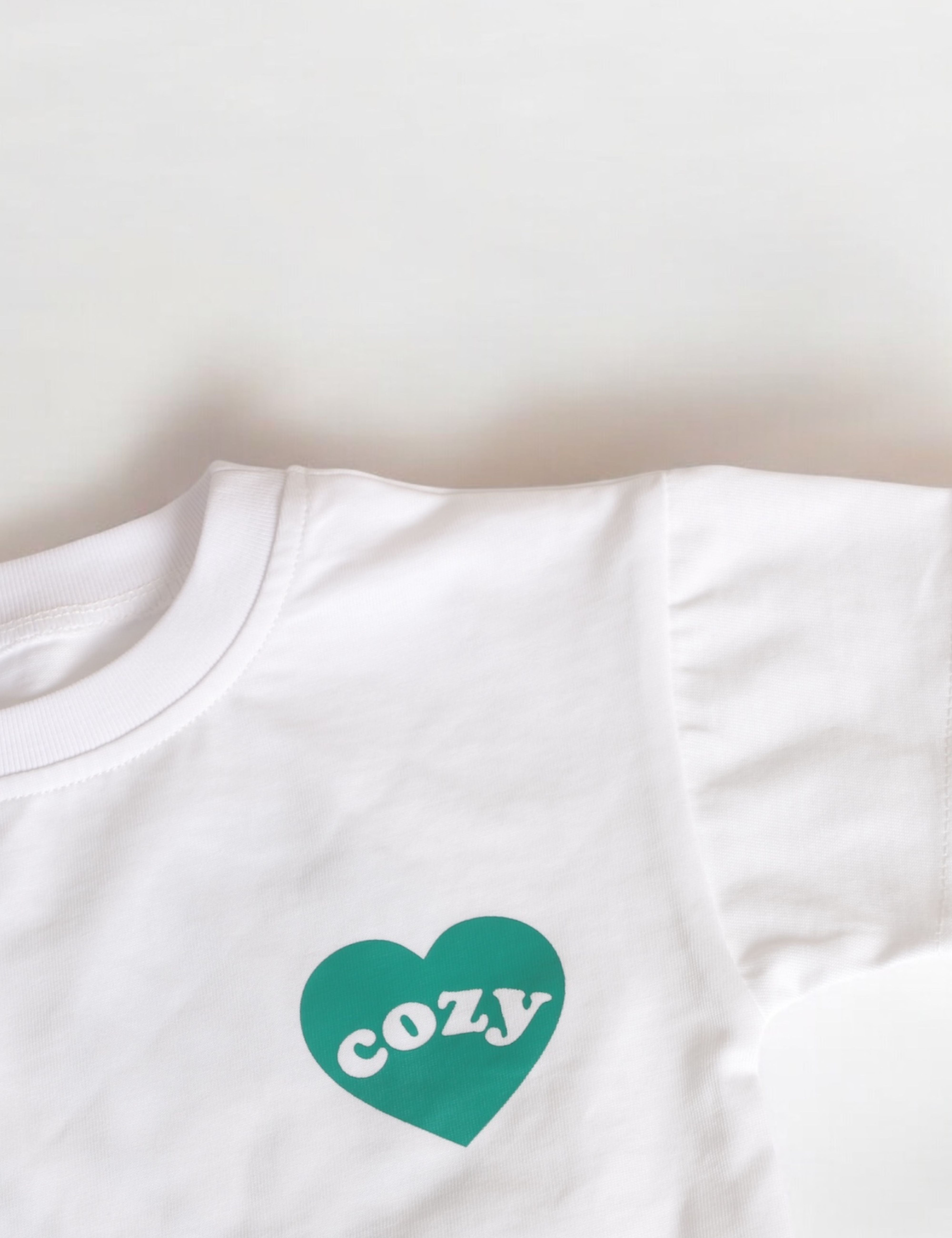 Cozy Heart Club Graphic Tee - White - Green Heart Cozy Crew Club T-Shirts mora-uk.myshopify.com cozy-heart-club-graphic-tee   All Products, aw25, BFCM-NEW20, CHRISTMAS20, navy, nonpersonalised, PADDY33, TOPS, ultracozy, whatnot, wholesale, wholesale-int, WINTER20